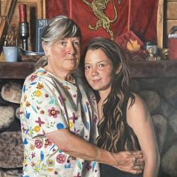Oil portrait of a woman and teen in front of their fireplace.