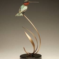 A metal sculpture of a Hummingbird by Don Rambadt