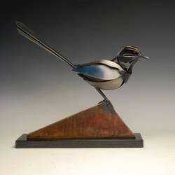 A magpie metal sculpture by Don Rambadt